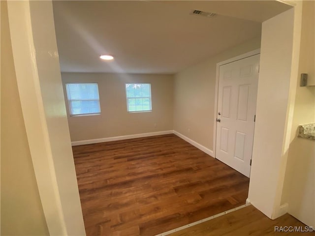 5175 E Tangelo Ln, Inverness, FL 34453 - spare room featuring wood finished floors, baseboards, and recessed lighting