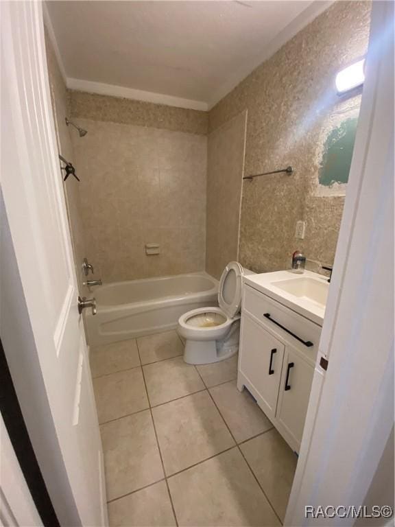 5175 E Tangelo Ln, Inverness, FL 34453 - full bathroom featuring tile patterned floors, toilet, vanity, and washtub / shower combination