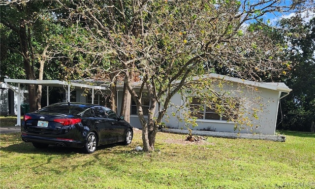 view of front of property with a front lawn