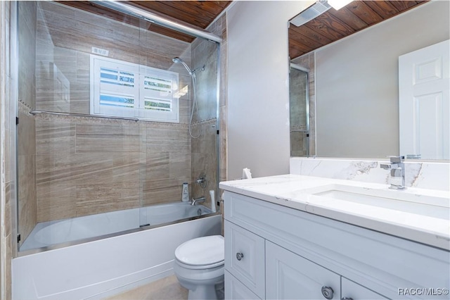 full bathroom with vanity, wood ceiling, bath / shower combo with glass door, and toilet