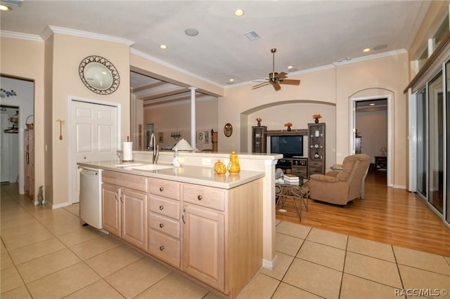 1112 W Diamond Shore Loop Unit 45, Hernando, FL 34442 - kitchen featuring open floor plan, ceiling fan, light tile patterned floors, ornamental molding, and light brown cabinetry