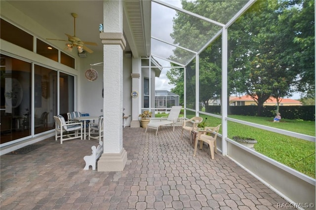 1112 W Diamond Shore Loop Unit 45, Hernando, FL 34442 - sunroom / solarium featuring a ceiling fan