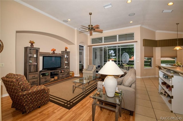 1112 W Diamond Shore Loop Unit 45, Hernando, FL 34442 - living area featuring ornamental molding, a ceiling fan, recessed lighting, light tile patterned floors, and arched walkways