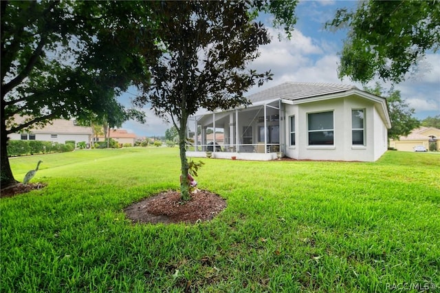 1112 W Diamond Shore Loop Unit 45, Hernando, FL 34442 - view of green lawn featuring a lanai