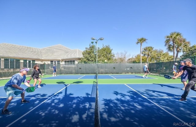 1112 W Diamond Shore Loop Unit 45, Hernando, FL 34442 - view of tennis court featuring community basketball court