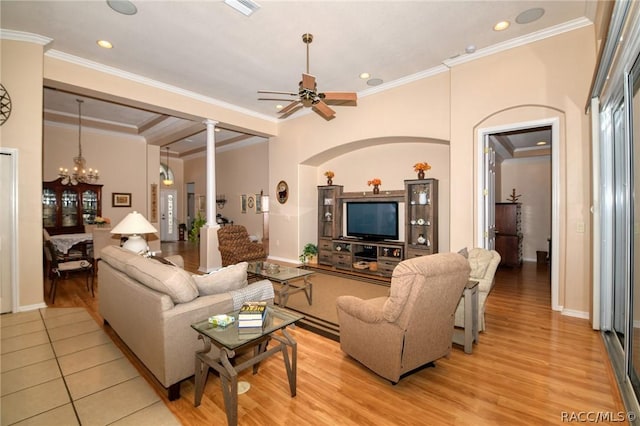 1112 W Diamond Shore Loop Unit 45, Hernando, FL 34442 - living area featuring a chandelier, ornamental molding, ceiling fan, decorative columns, and light wood-style floors