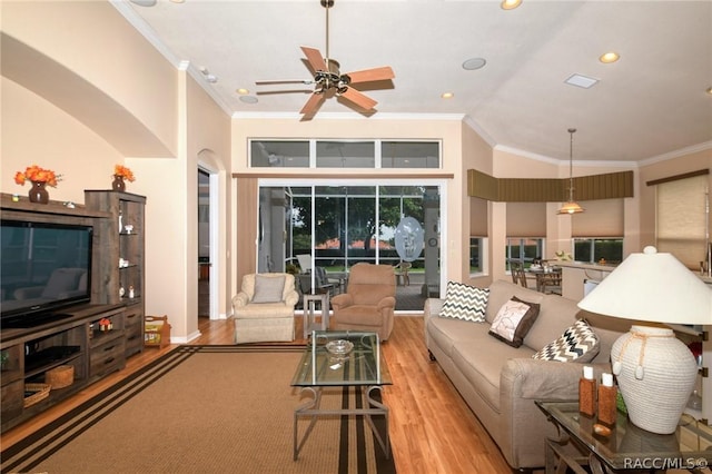 1112 W Diamond Shore Loop Unit 45, Hernando, FL 34442 - living room with light wood-style flooring, ceiling fan, ornamental molding, recessed lighting, and a high ceiling