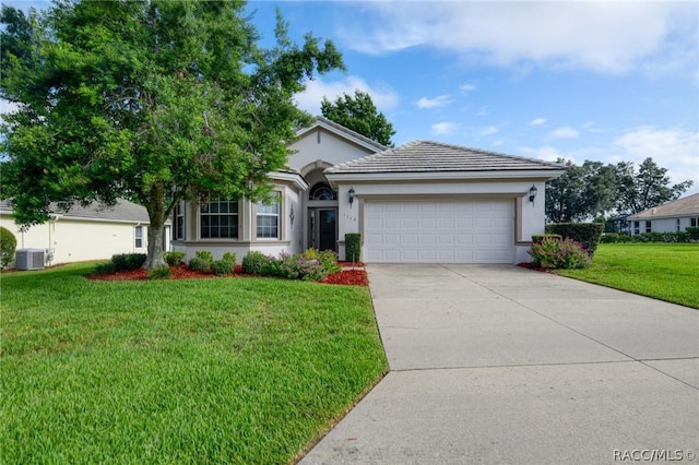 1112 W Diamond Shore Loop Unit 45, Hernando, FL 34442 - ranch-style home featuring an attached garage, a front yard, stucco siding, and driveway