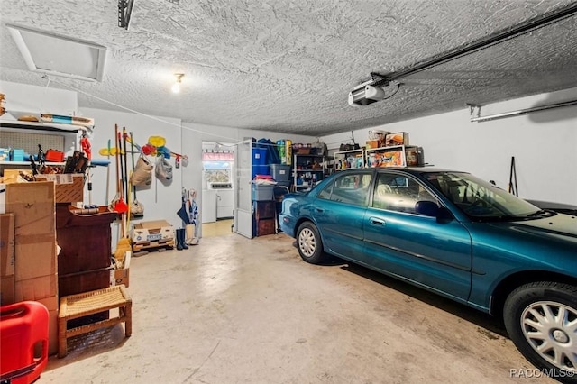 garage featuring a garage door opener