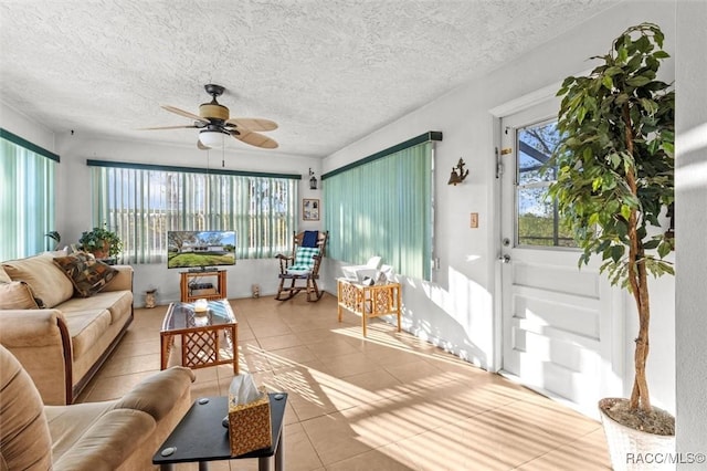 sunroom with a ceiling fan