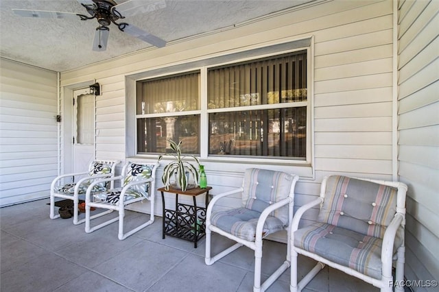 view of patio / terrace featuring a porch and a ceiling fan