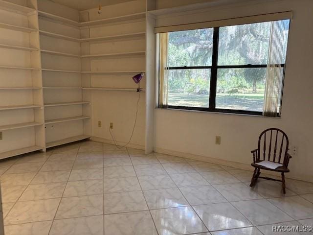 view of tiled spare room