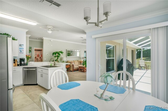 795 W Toucan Loop, Hernando, FL 34442 - dining area with ornamental molding, a ceiling fan, and light tile patterned floors