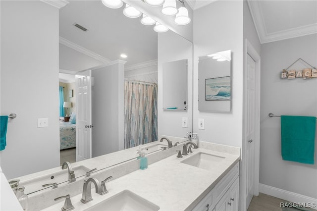 795 W Toucan Loop, Hernando, FL 34442 - ensuite bathroom with ornamental molding, double vanity, and baseboards