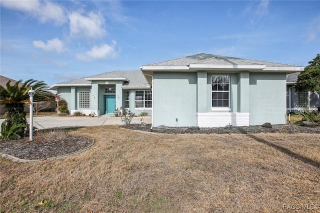 view of front of home with a front yard