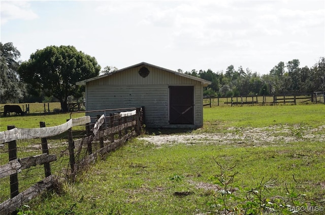 view of outdoor structure featuring a rural view