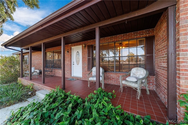 entrance to property with a porch