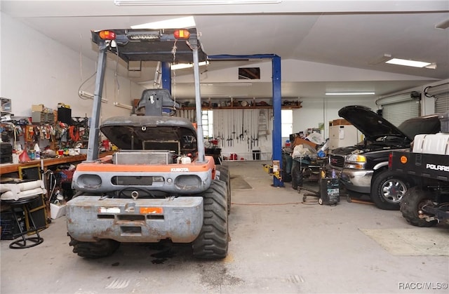 garage with a workshop area