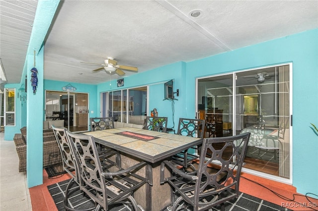 view of patio / terrace with ceiling fan