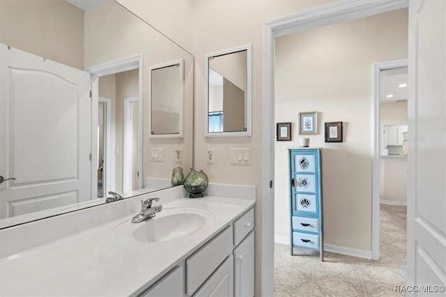 251 W Rexford Dr, Beverly Hills, FL 34465 - bathroom with vanity and baseboards