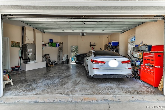 garage featuring a garage door opener