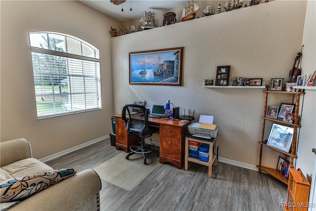 office area featuring hardwood / wood-style floors and ceiling fan