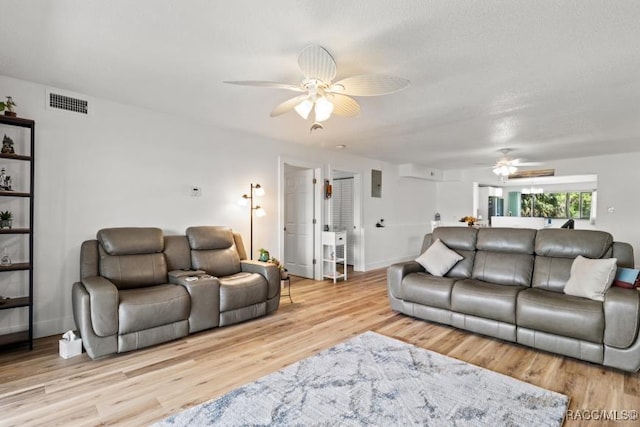 10684 W Halls River Rd Unit 2, Homosassa, FL 34448 - living area featuring ceiling fan and wood finished floors