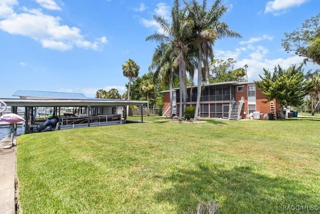 10684 W Halls River Rd Unit 2, Homosassa, FL 34448 - view of green lawn with stairs
