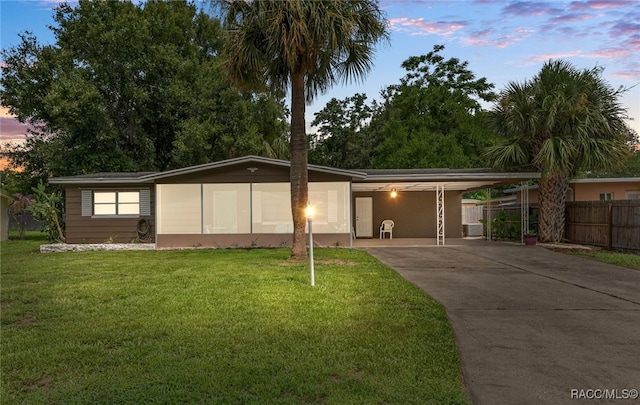 4 S Columbus St, Beverly Hills, FL 34465 - ranch-style house featuring an attached carport and driveway