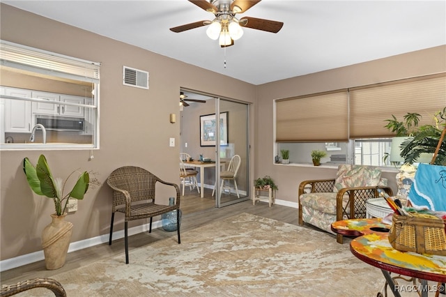 4 S Columbus St, Beverly Hills, FL 34465 - sitting room with ceiling fan and wood finished floors