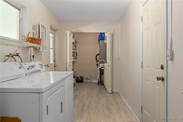 4 S Columbus St, Beverly Hills, FL 34465 - laundry room featuring independent washer and dryer and light wood-type flooring