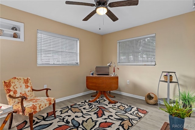 4 S Columbus St, Beverly Hills, FL 34465 - living area with wood finished floors and a ceiling fan