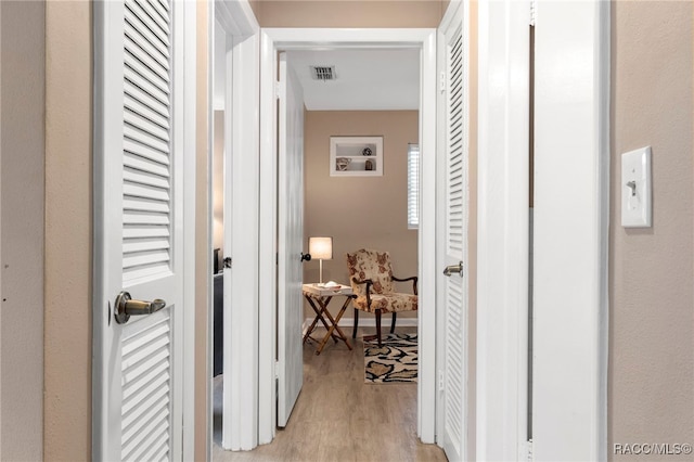4 S Columbus St, Beverly Hills, FL 34465 - hallway featuring light wood-style floors