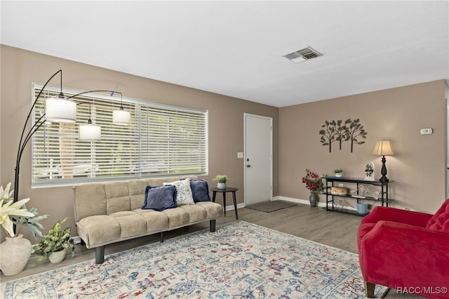 4 S Columbus St, Beverly Hills, FL 34465 - living room with wood finished floors and baseboards
