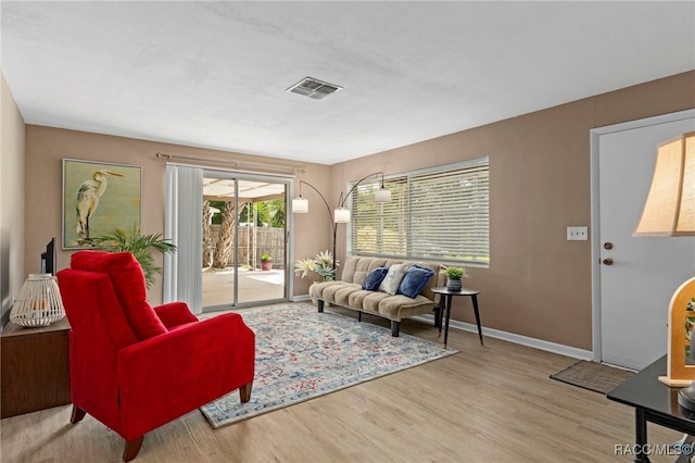 4 S Columbus St, Beverly Hills, FL 34465 - living room featuring wood finished floors and baseboards