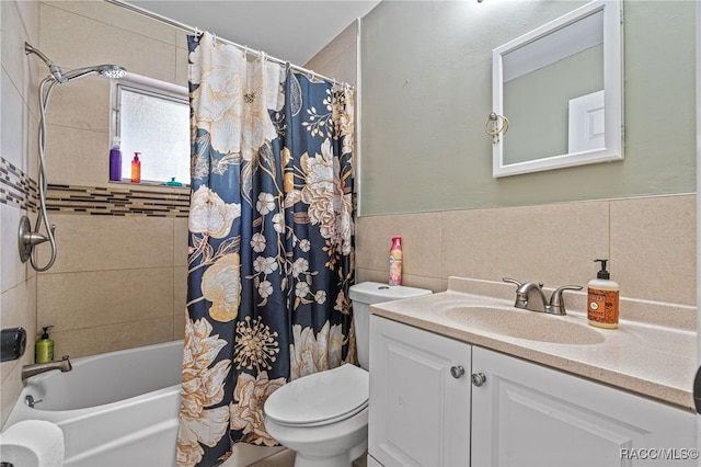 8 S Columbus St, Beverly Hills, FL 34465 - full bath with vanity, shower / bath combination with curtain, tile walls, and a wainscoted wall