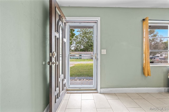 8 S Columbus St, Beverly Hills, FL 34465 - entryway with light tile patterned floors and baseboards