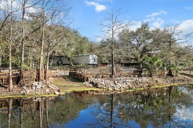 back of house with a sunroom