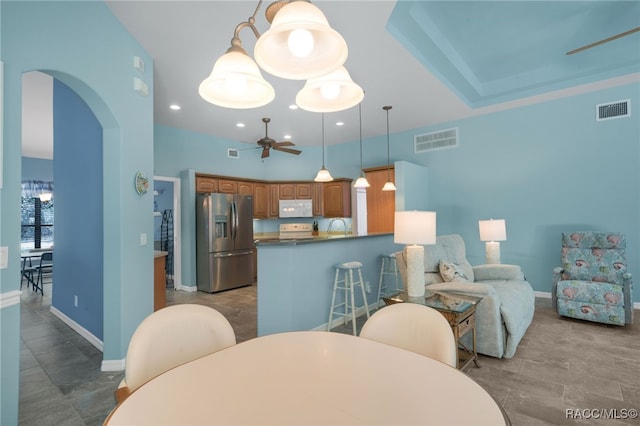 dining room with ceiling fan