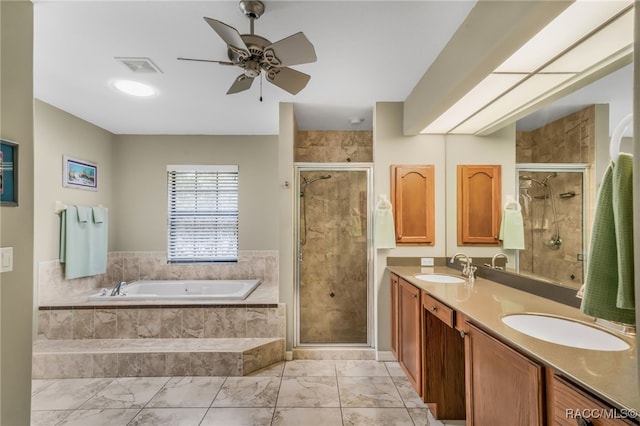 bathroom with ceiling fan, vanity, and independent shower and bath