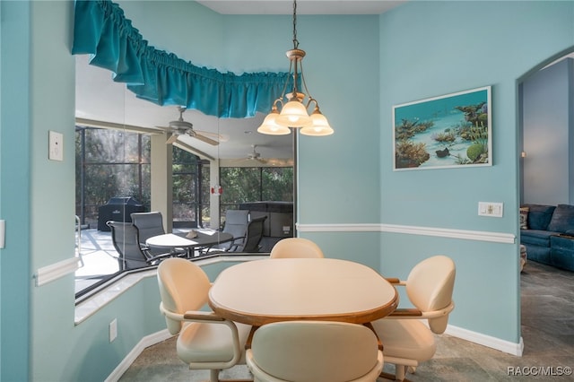 dining space featuring ceiling fan