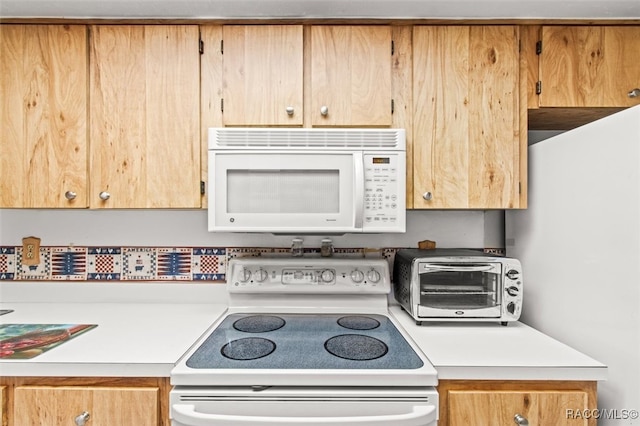 kitchen featuring white appliances