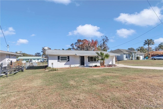 view of front of home with a front lawn