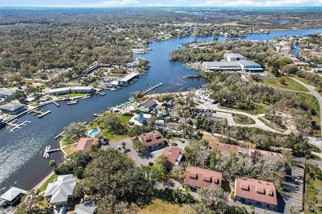 birds eye view of property with a residential view and a water view