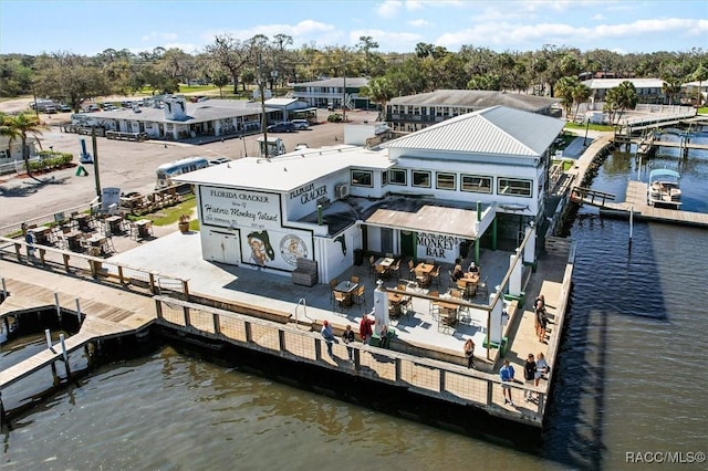 exterior space with a water view