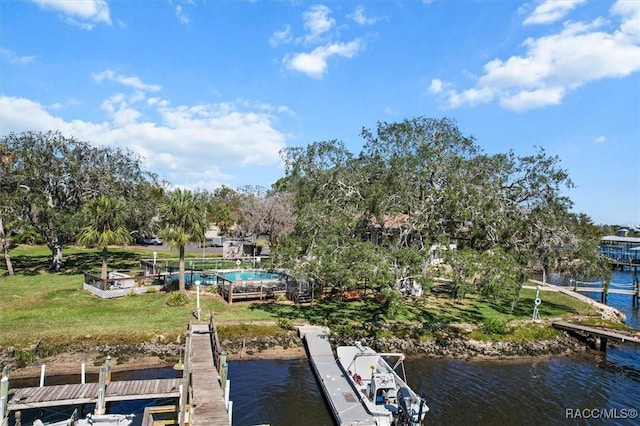 dock area with a water view