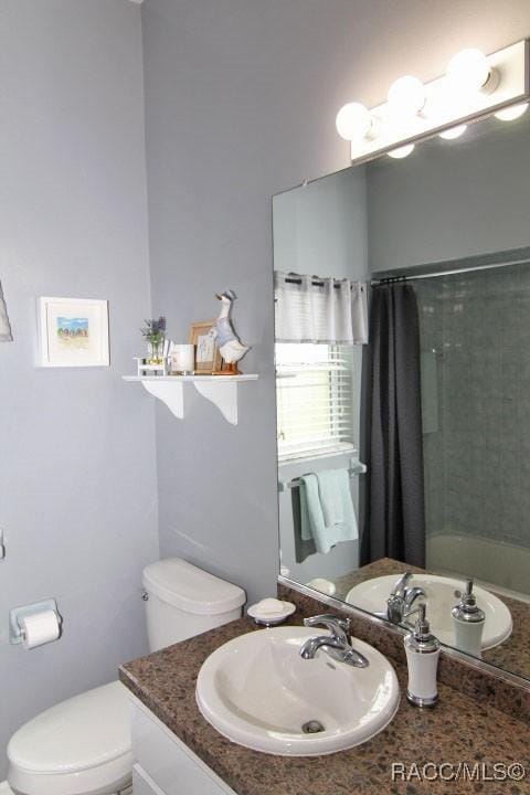 2745 N Canterbury Lake Dr, Hernando, FL 34442 - bathroom with vanity and toilet