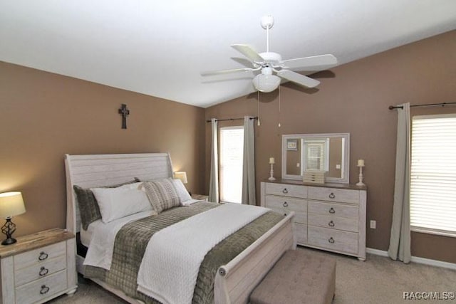 2745 N Canterbury Lake Dr, Hernando, FL 34442 - bedroom with light carpet, lofted ceiling, and a ceiling fan
