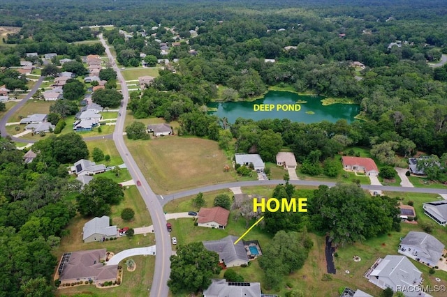 2745 N Canterbury Lake Dr, Hernando, FL 34442 - aerial perspective of suburban area featuring a large body of water and a forest