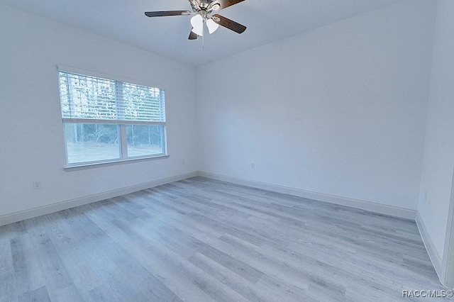 spare room featuring ceiling fan and light hardwood / wood-style floors